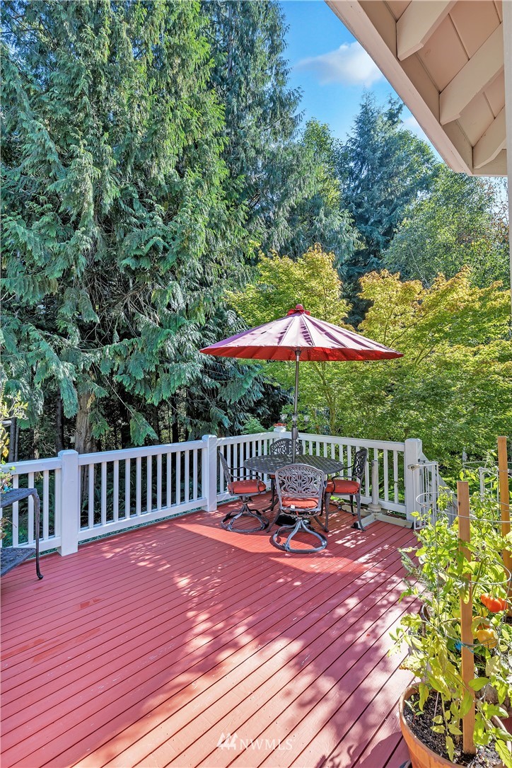 4916 177th Place Southeast Bothell, WA 98012 - Photo 23 of 25 a patio with wooden floor and yard