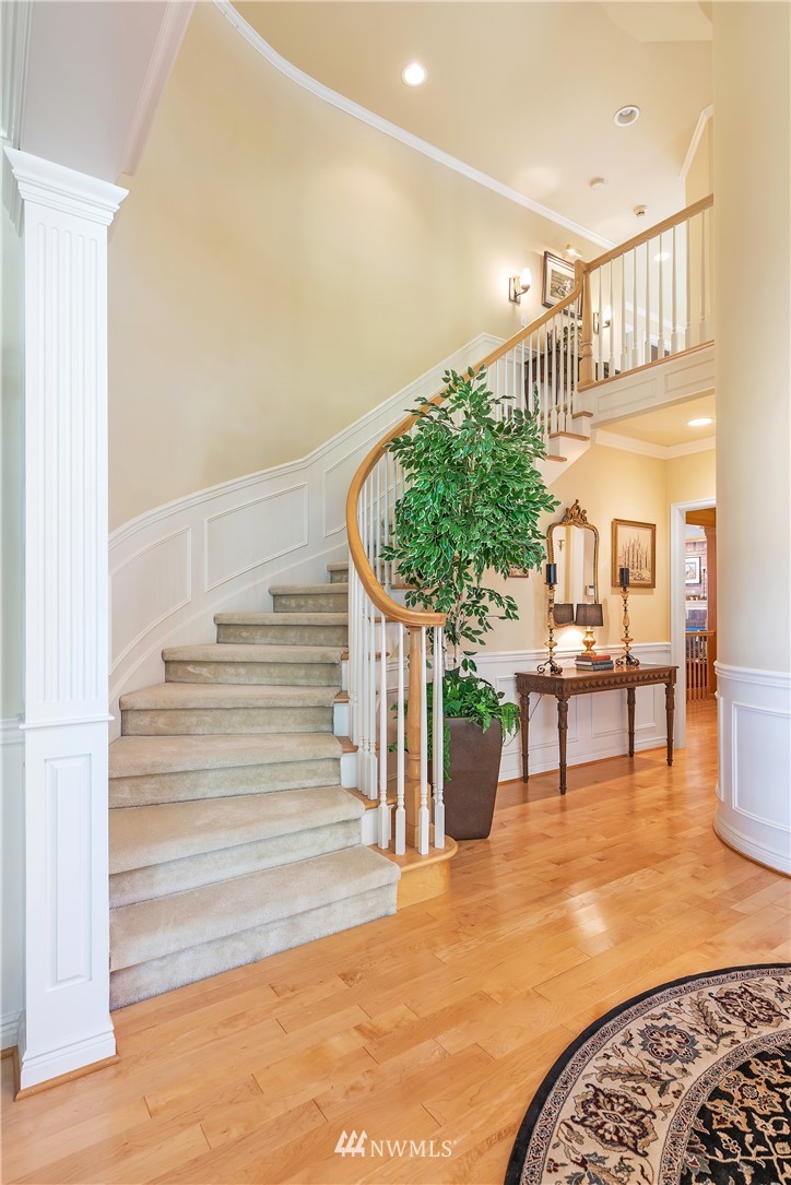 4916 177th Place Southeast Bothell, WA 98012 - Photo 4 of 25 a view of entryway and hall with wooden floor