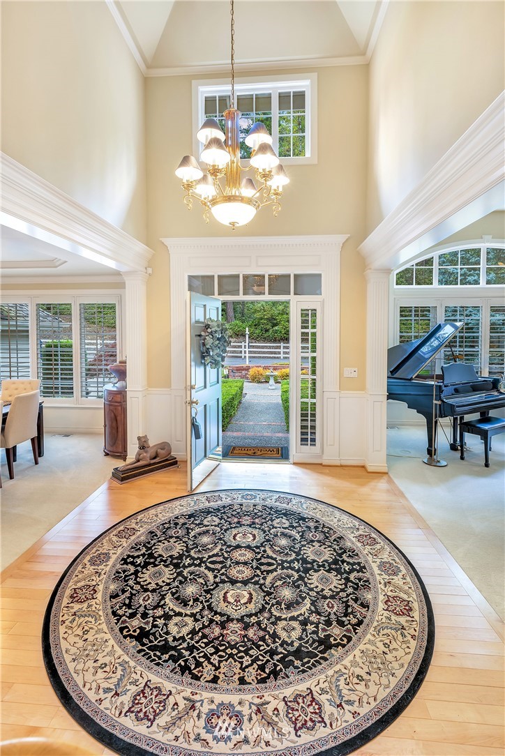 4916 177th Place Southeast Bothell, WA 98012 - Photo 5 of 25 a view of a livingroom with furniture wooden floor and windows