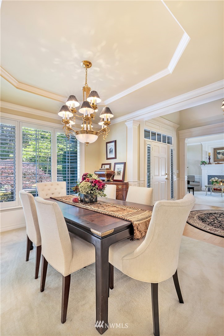 4916 177th Place Southeast Bothell, WA 98012 - Photo 7 of 25 a view of a dining room with furniture window and outside view