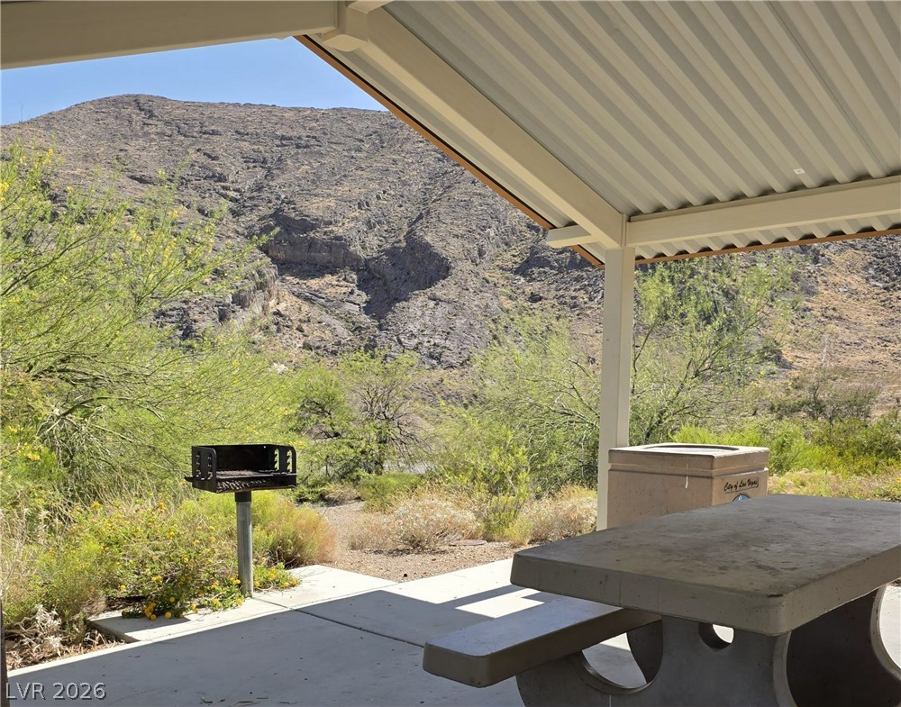 10550 West Alexander Road, Unit 2183 Las Vegas, NV 89129 - Photo 19 of 22 Enjoy outdoor dining and mountain views from this covered patio.