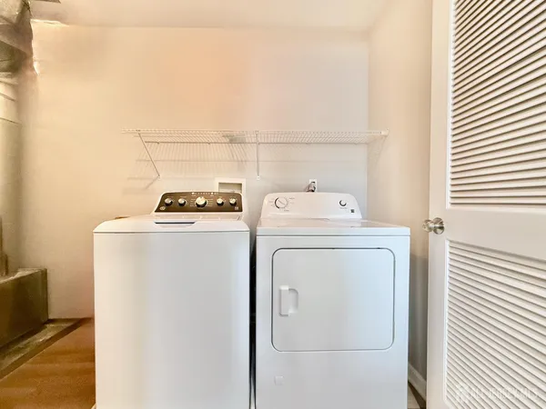 a utility room with dryer and washer