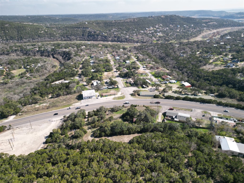 18348 Ranch To Market 1431 Jonestown, TX 78645 - Photo 5 of 6 an aerial view of town with residential houses and green space
