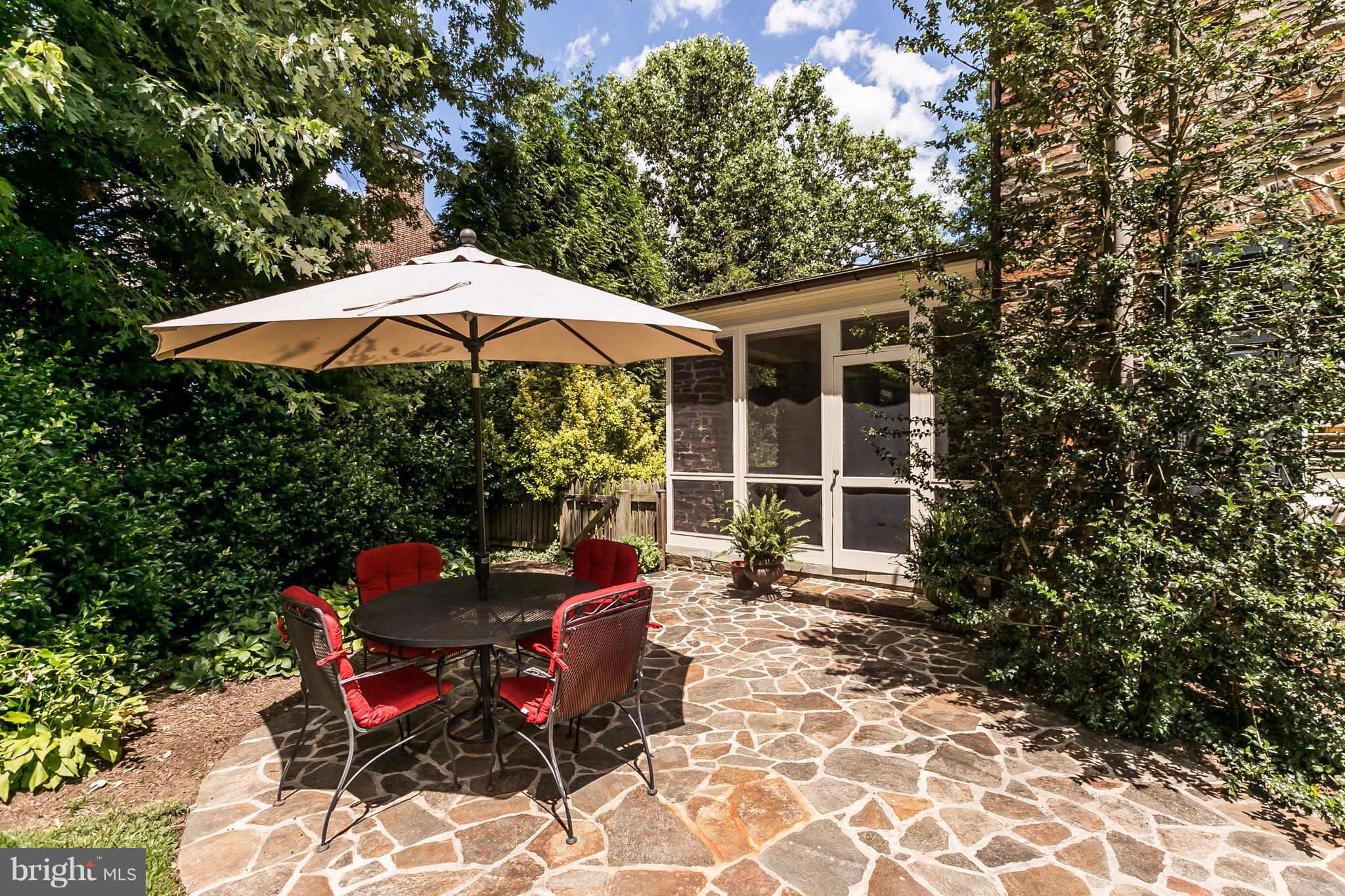 6306 Blenheim Road Baltimore, MD 21212 - Photo 28 of 30 a view of backyard with outdoor seating and trees
