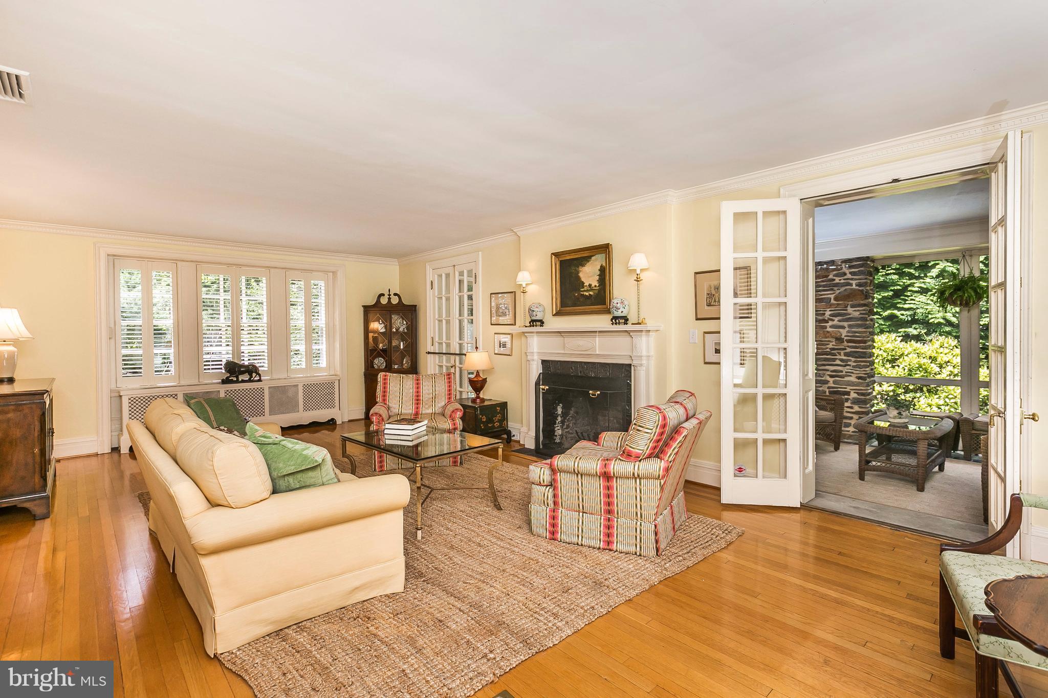 6306 Blenheim Road Baltimore, MD 21212 - Photo 5 of 30 a living room with fireplace furniture and a fireplace