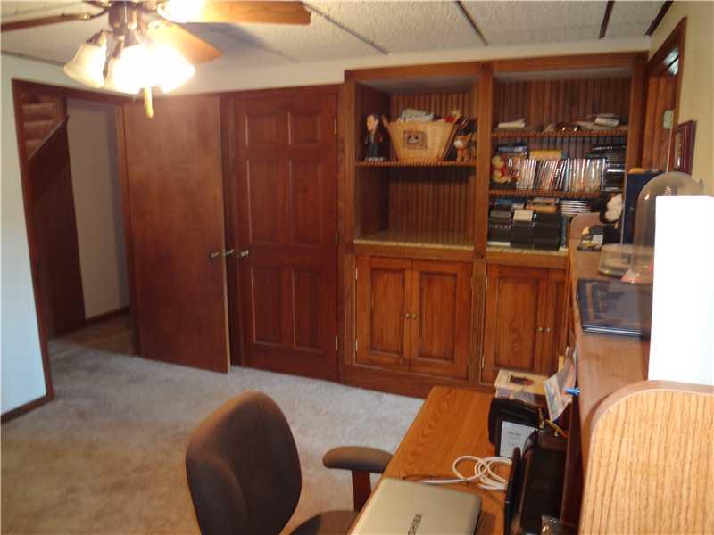 261 Darr Road Belle Vernon, PA 15012 - Photo 16 of 25 Bedroom. 4th Bedroom / Office in Lower Level / Bedroom area for "in-Law" living space. Nice built-in closet and bookcases. Great flexible living options.