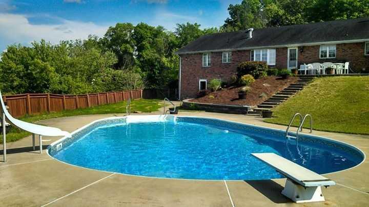 261 Darr Road Belle Vernon, PA 15012 - Photo 22 of 25 Swimming Pool/Hot Tub/Sauna. View at the turn of the fall season of the In-ground Swimming Pool with dive and slide and Pool House.