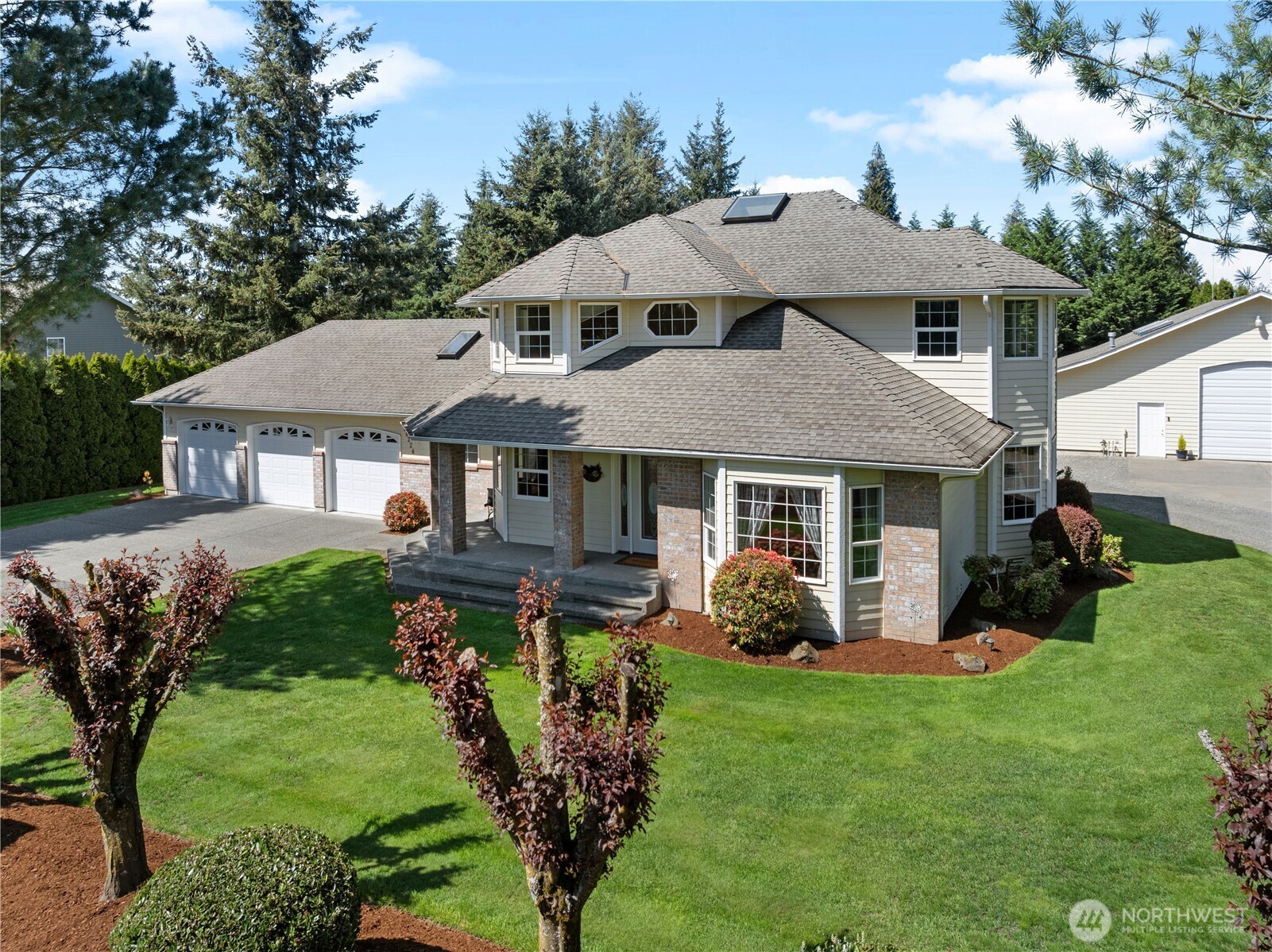26224 Southeast 425th Street Enumclaw, WA 98022 - Photo 1 of 37 a aerial view of a house with a yard table and chairs