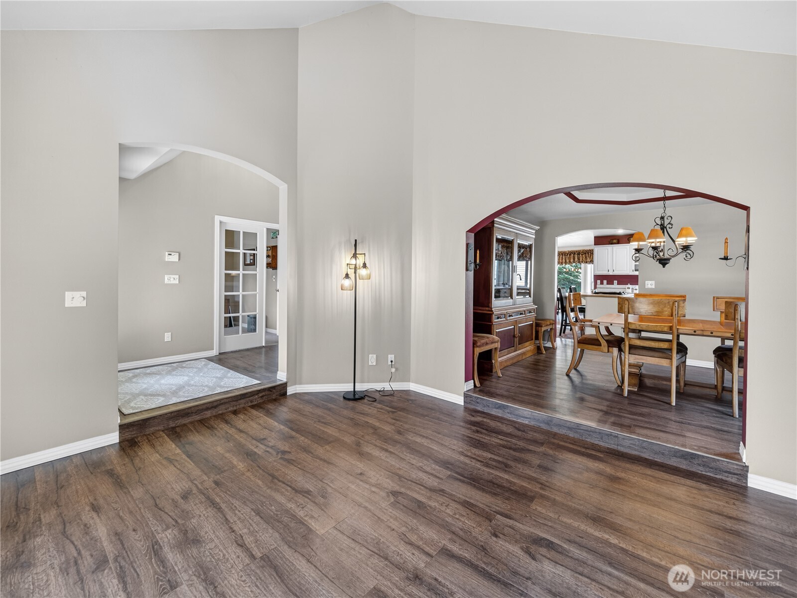 26224 Southeast 425th Street Enumclaw, WA 98022 - Photo 11 of 37 a view of a living room and dining room with wooden floor