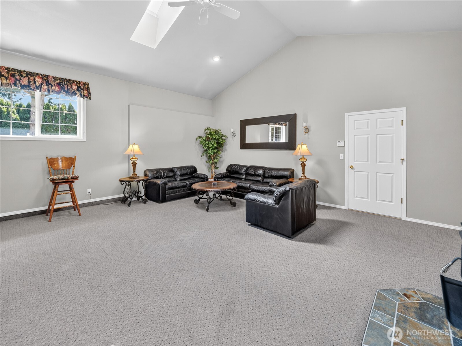 26224 Southeast 425th Street Enumclaw, WA 98022 - Photo 15 of 37 a living room with furniture a window and a lamp