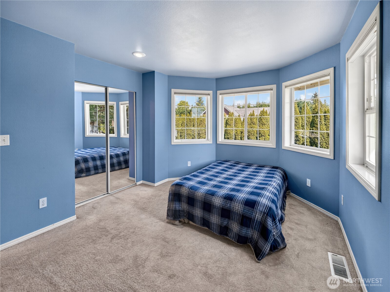 26224 Southeast 425th Street Enumclaw, WA 98022 - Photo 25 of 37 a bedroom with a bed and a table