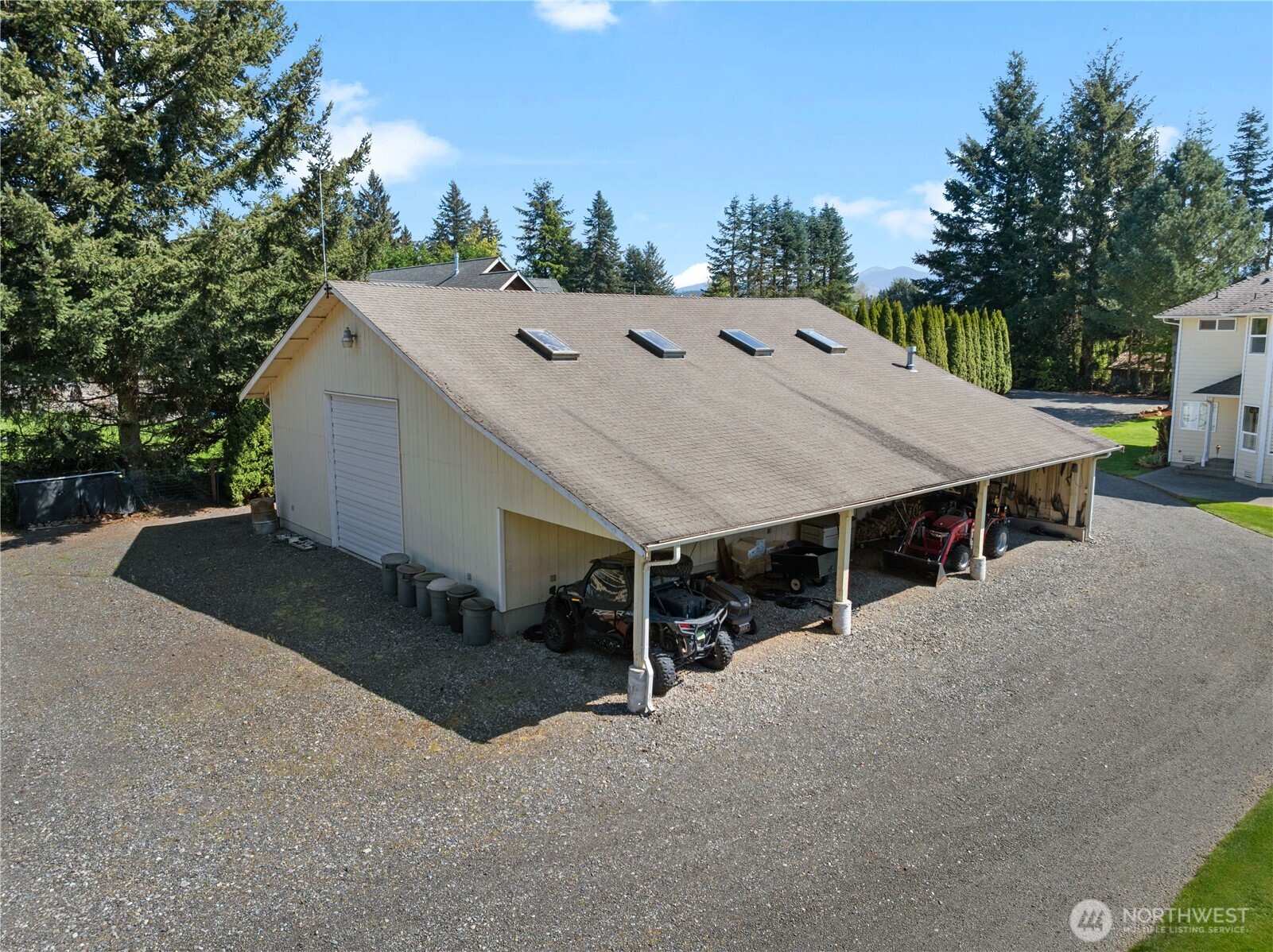 26224 Southeast 425th Street Enumclaw, WA 98022 - Photo 29 of 37 an aerial view of a house with yard and garage