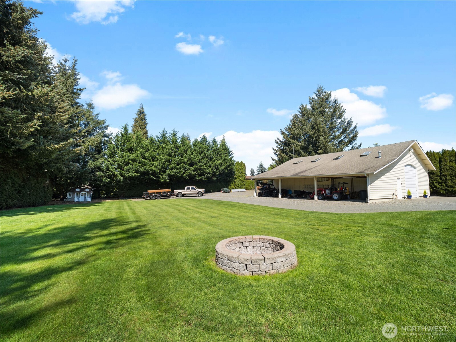 26224 Southeast 425th Street Enumclaw, WA 98022 - Photo 34 of 37 a view of a house with a backyard
