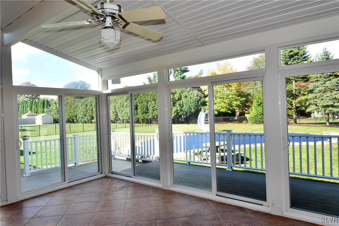 830 Macada Road Bethlehem, PA 18017 - Photo 18 of 35 a view of an empty room with wooden floor and a floor to ceiling window
