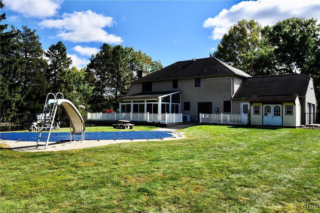 830 Macada Road Bethlehem, PA 18017 - Photo 30 of 35 a view of a house with pool and a yard