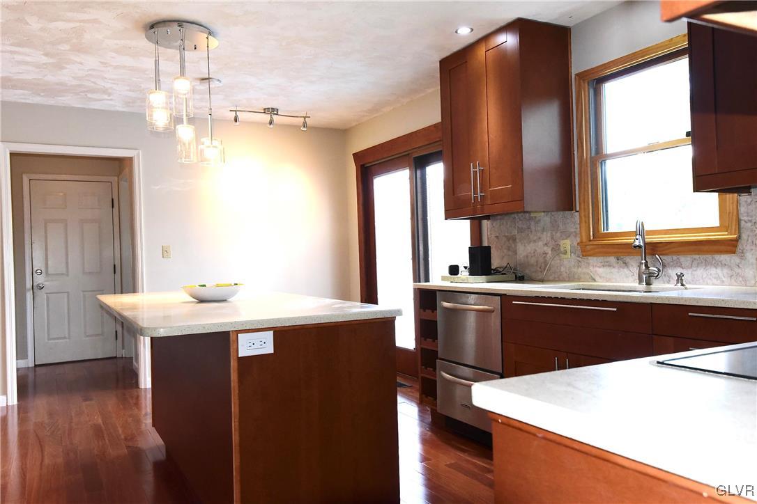 830 Macada Road Bethlehem, PA 18017 - Photo 6 of 35 a kitchen with a sink a window and appliances