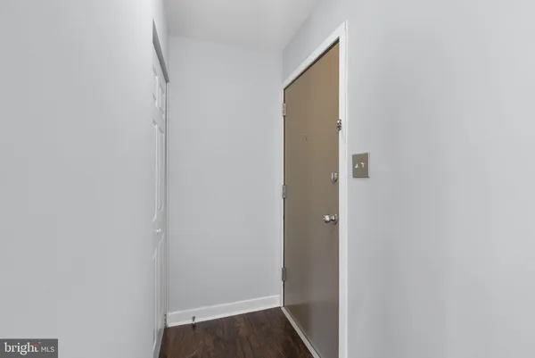 a view of an empty room with a garage