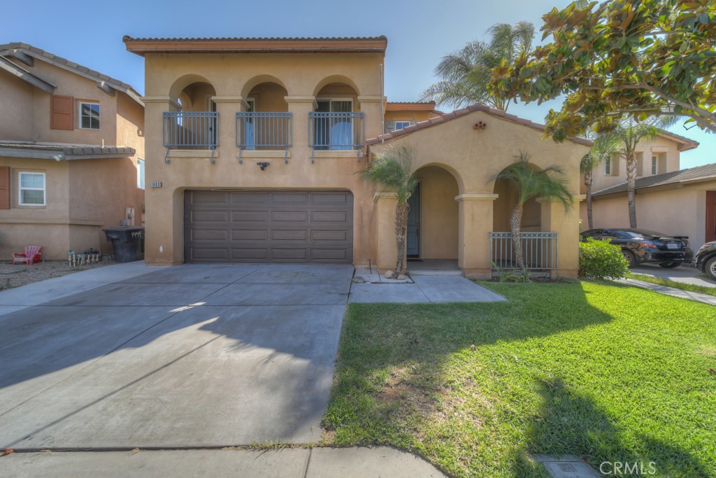 1443 Alta Palma Road Perris, CA 92571 - Photo 1 of 1 a front view of a house with garden
