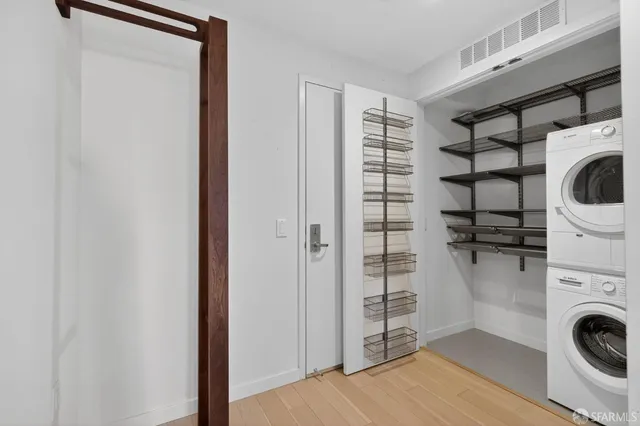 a view of a storage & utility room with washer and dryer