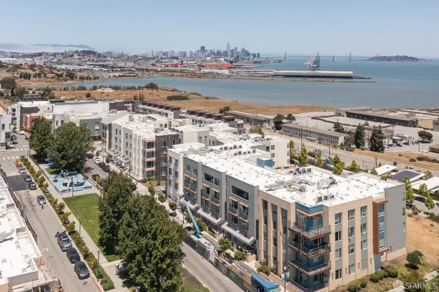 a view of a lake with building in front of it