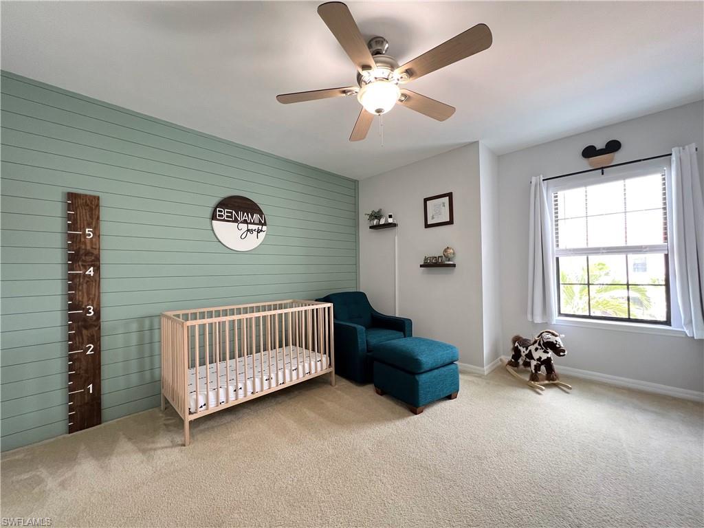 14776 Sutherland Avenue, Unit 416 Naples, FL 34119 - Photo 35 of 50 a view of livingroom with furniture and windows