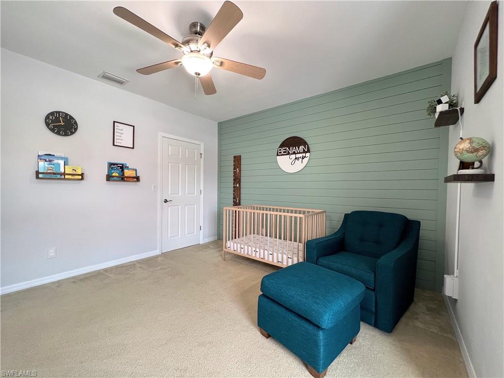 14776 Sutherland Avenue, Unit 416 Naples, FL 34119 - Photo 37 of 50 a view of livingroom with furniture and a ceiling fan