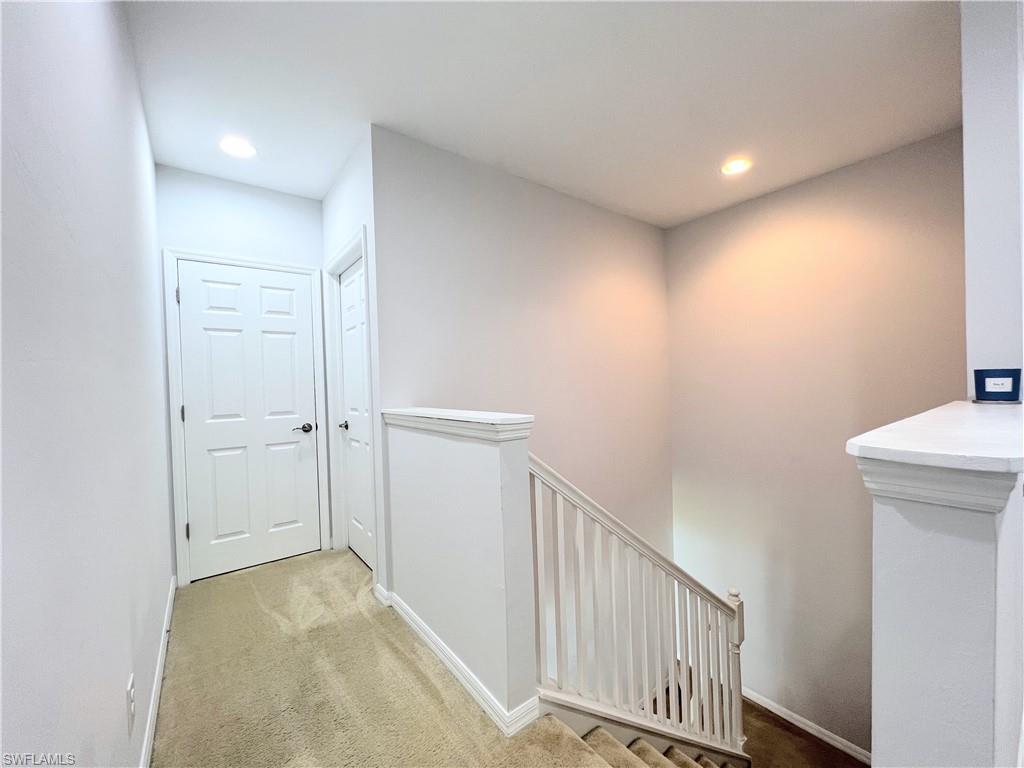 14776 Sutherland Avenue, Unit 416 Naples, FL 34119 - Photo 44 of 50 a view of a hallway