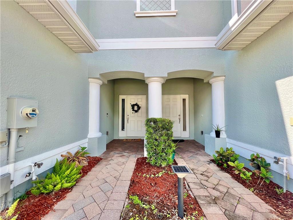 14776 Sutherland Avenue, Unit 416 Naples, FL 34119 - Photo 5 of 50 a front view of a house