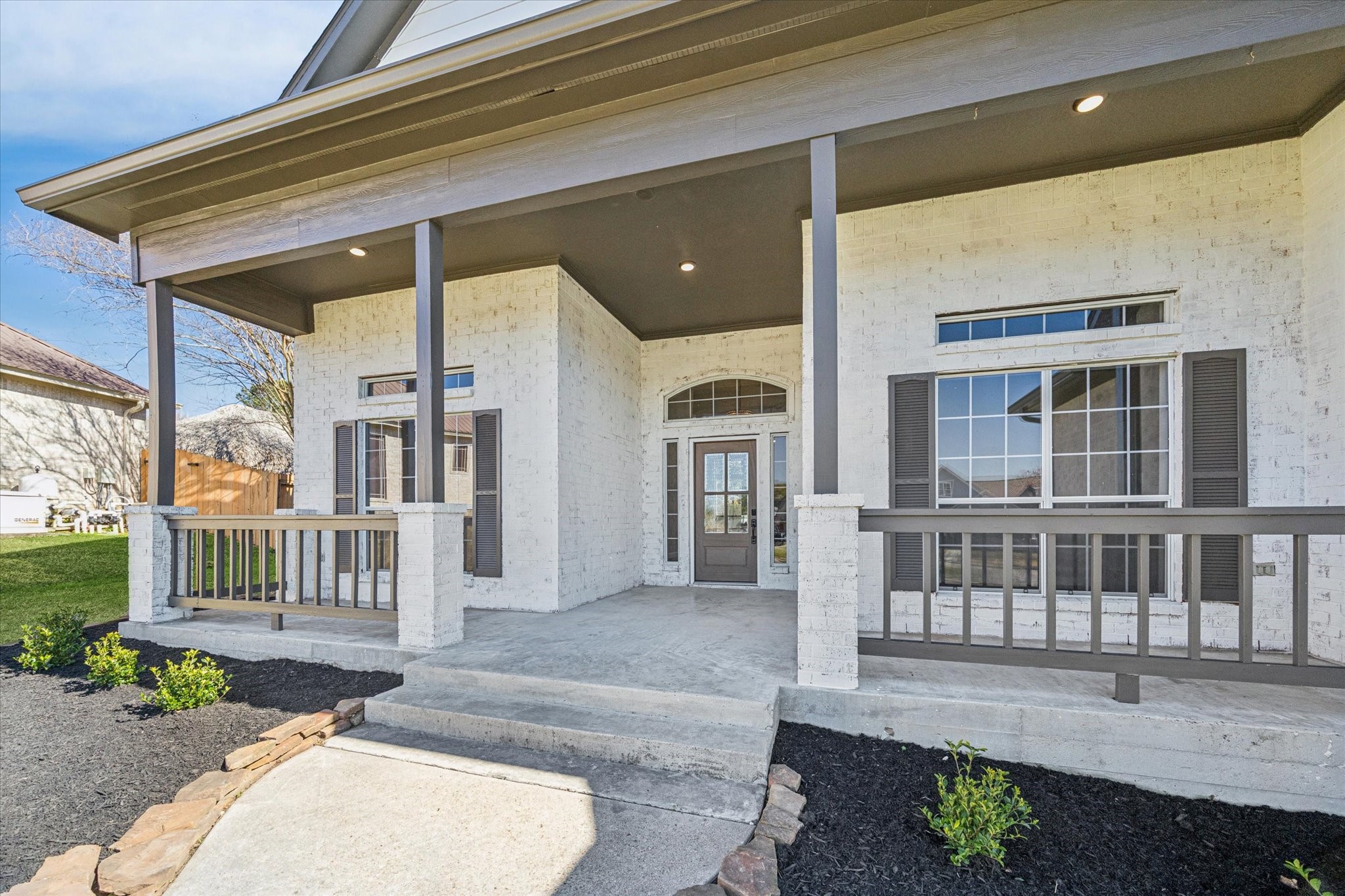 5437 Edgewater Court Willis, TX 77318 - Photo 2 of 29 a view of a house with a porch