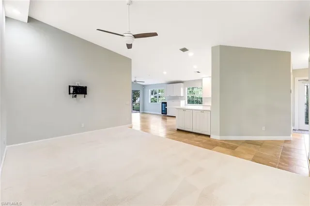 a view of a kitchen with a sink
