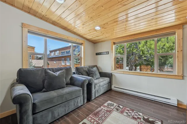 a kitchen with granite countertop a sink and cabinets