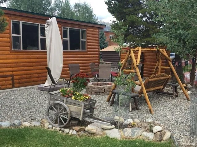 a view of a backyard with tree s
