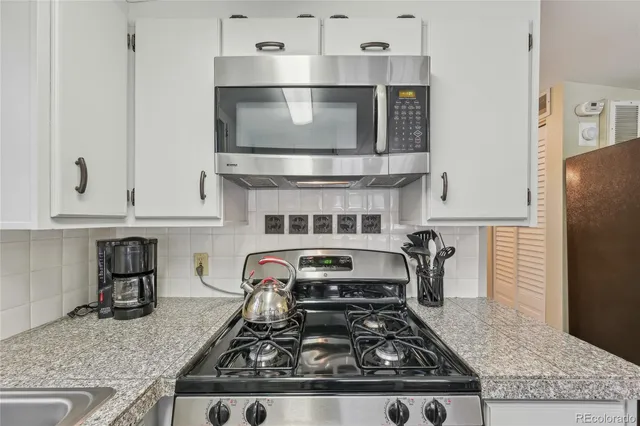 a view of a living room and furniture