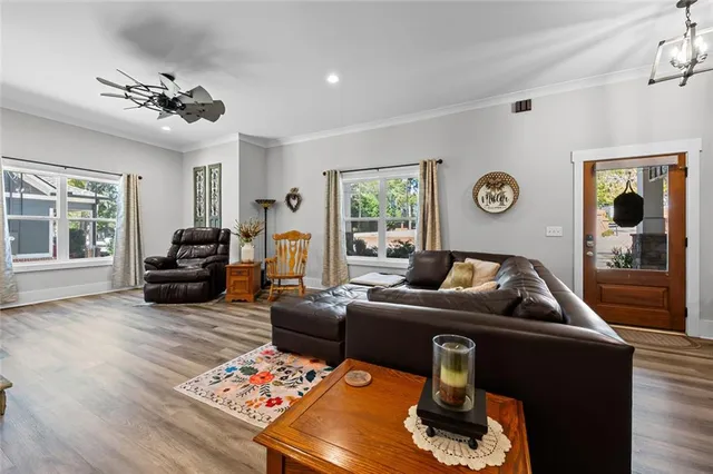 a living room with furniture and a window