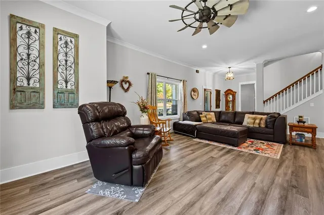 a living room with furniture or couch and a window