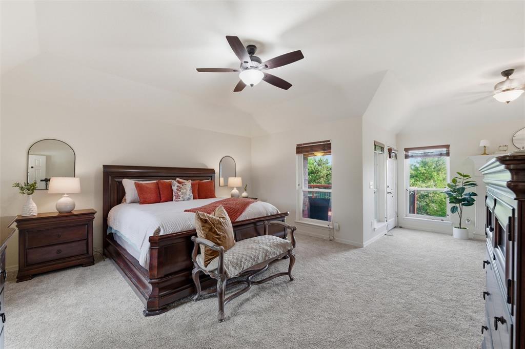 1820 Winningkoff Road Lucas, TX 75002 - Photo 18 of 40 Primary Bedroom offers access to a balcony with a gorgeous view.