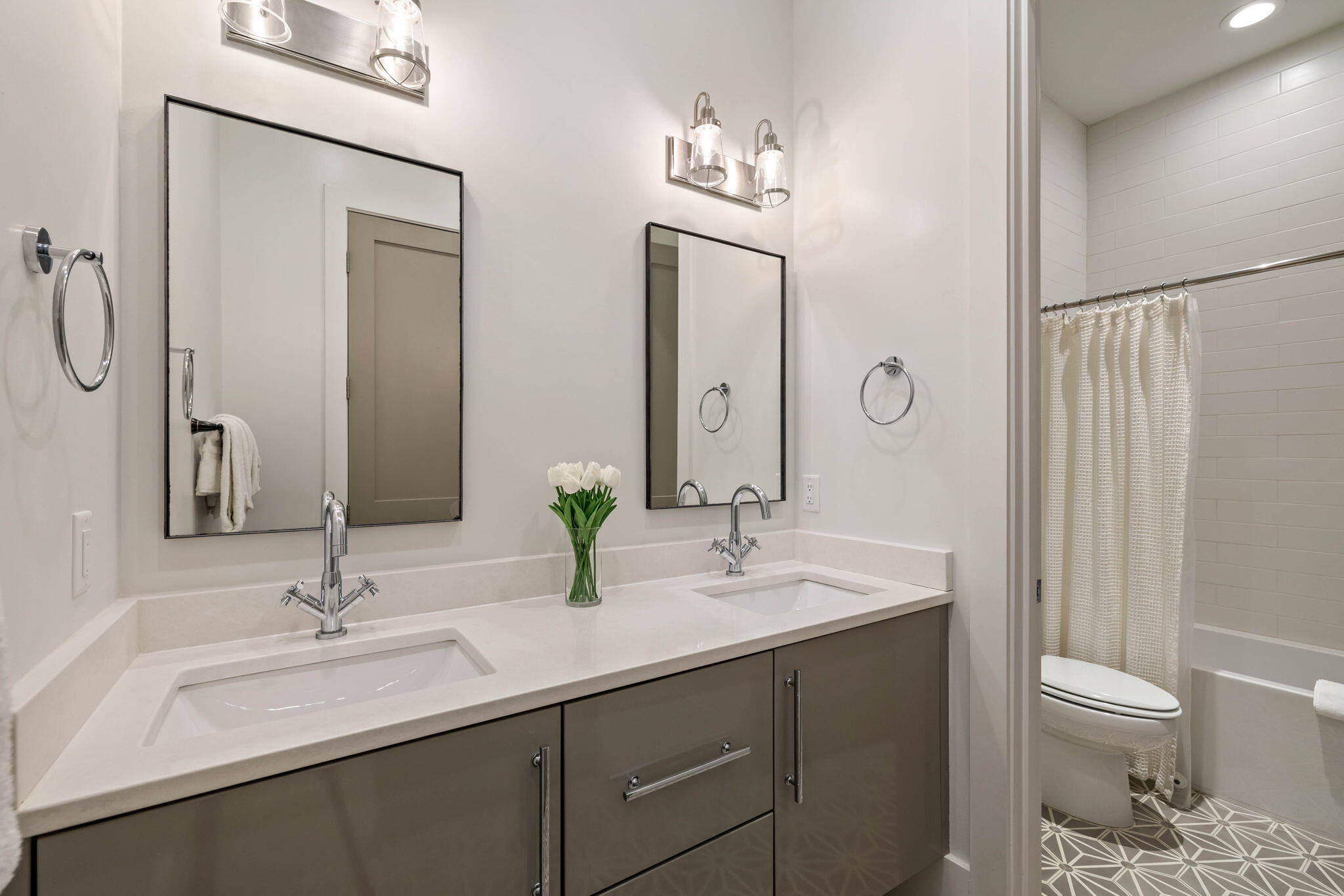 3537 East County Highway 30A Santa Rosa Beach, FL 32459 - Photo 13 of 56 a bathroom with a sink and a mirror