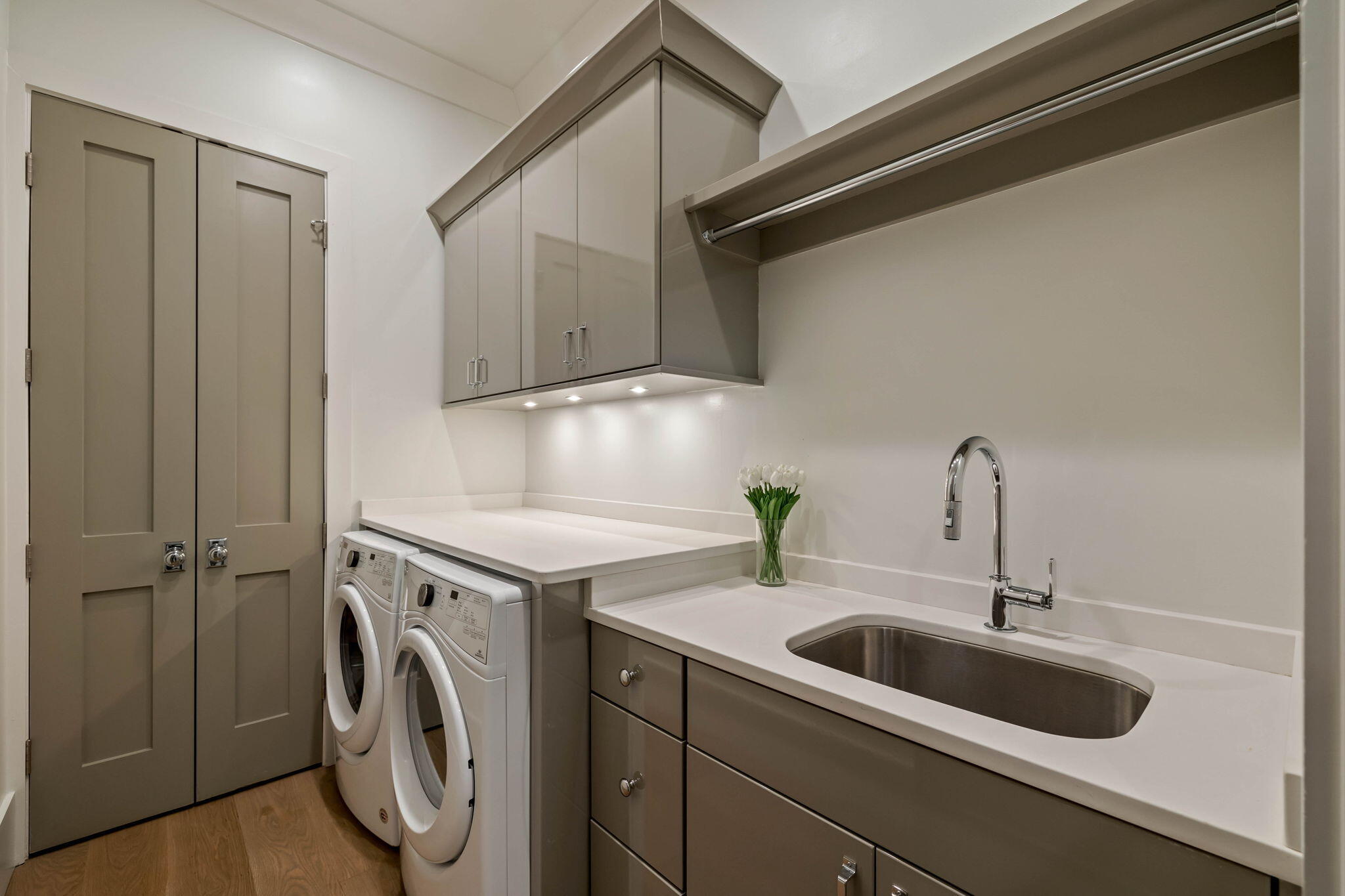 3537 East County Highway 30A Santa Rosa Beach, FL 32459 - Photo 14 of 56 a kitchen with a sink a washer and dryer