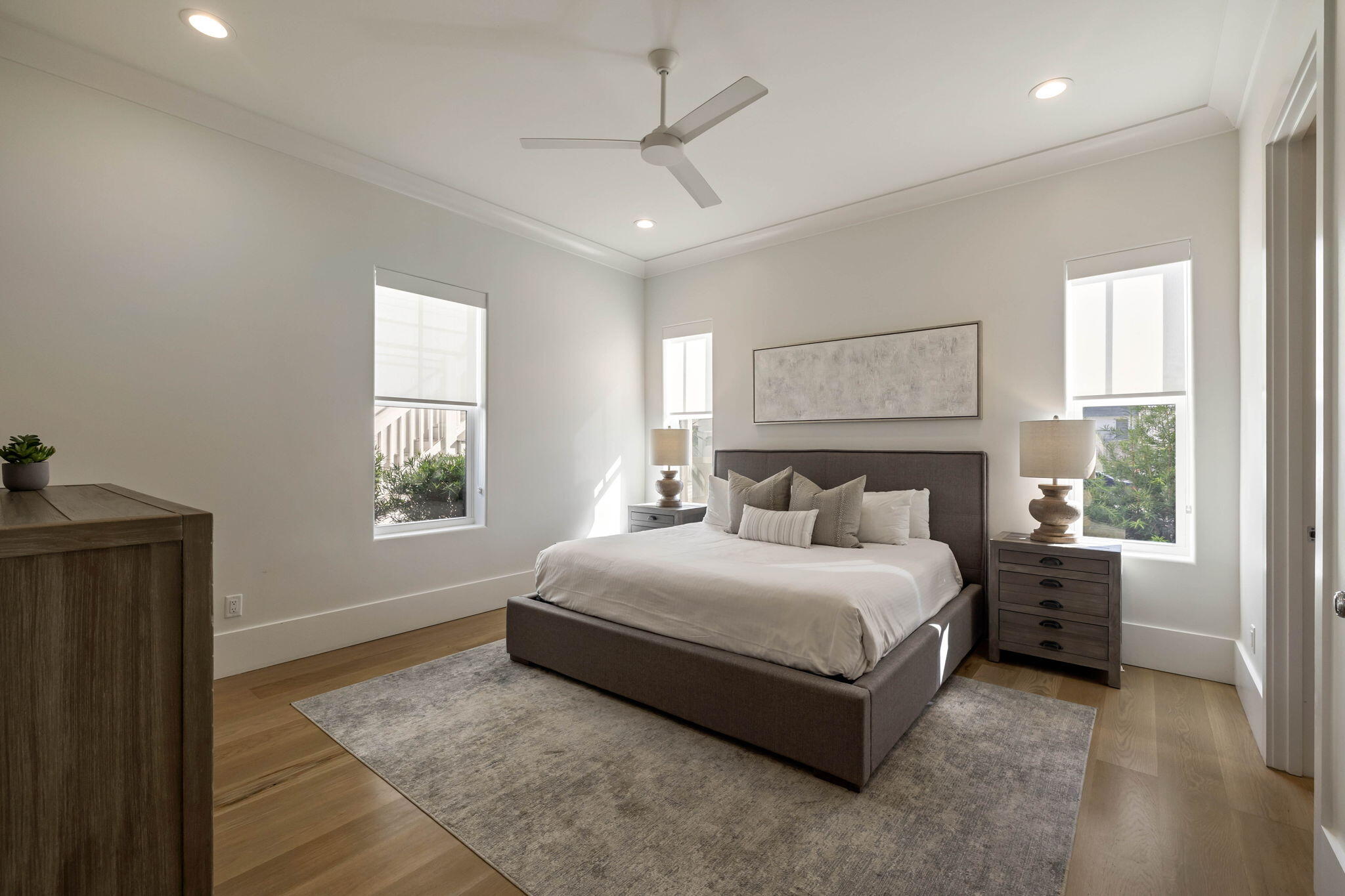 3537 East County Highway 30A Santa Rosa Beach, FL 32459 - Photo 16 of 56 a spacious bedroom with a bed and a window