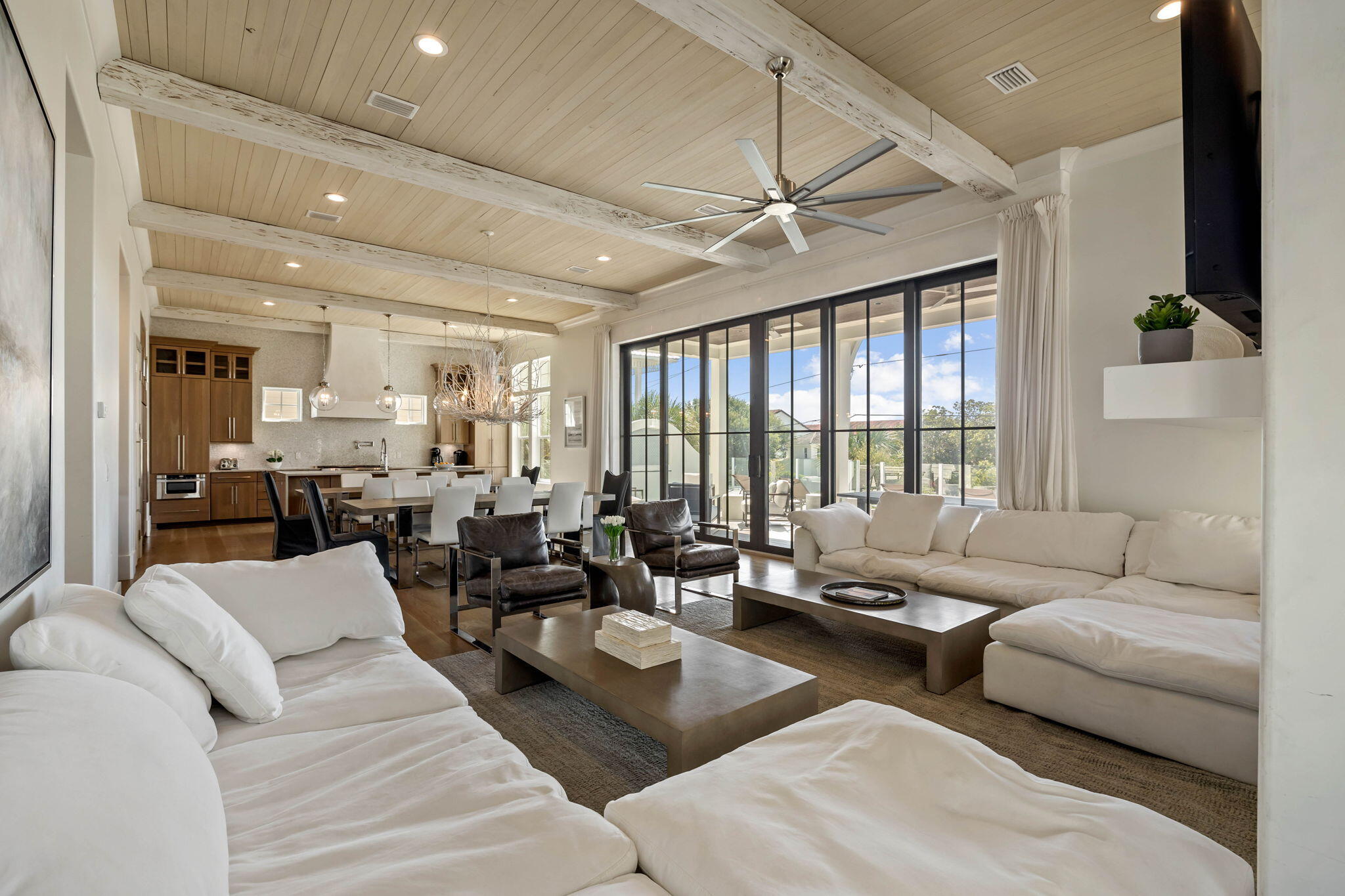 3537 East County Highway 30A Santa Rosa Beach, FL 32459 - Photo 22 of 56 a living room with furniture and a large window