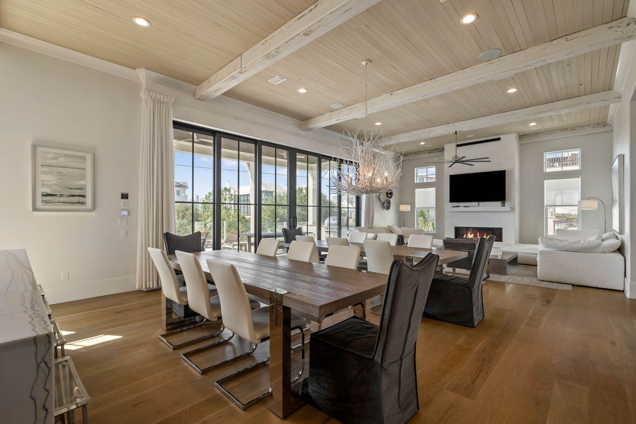 3537 East County Highway 30A Santa Rosa Beach, FL 32459 - Photo 26 of 56 a view of a dining room with furniture window and wooden floor