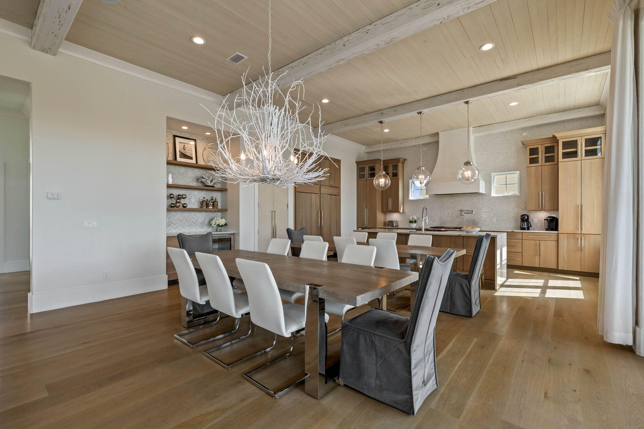 3537 East County Highway 30A Santa Rosa Beach, FL 32459 - Photo 27 of 56 a view of a dining room with furniture and wooden floor