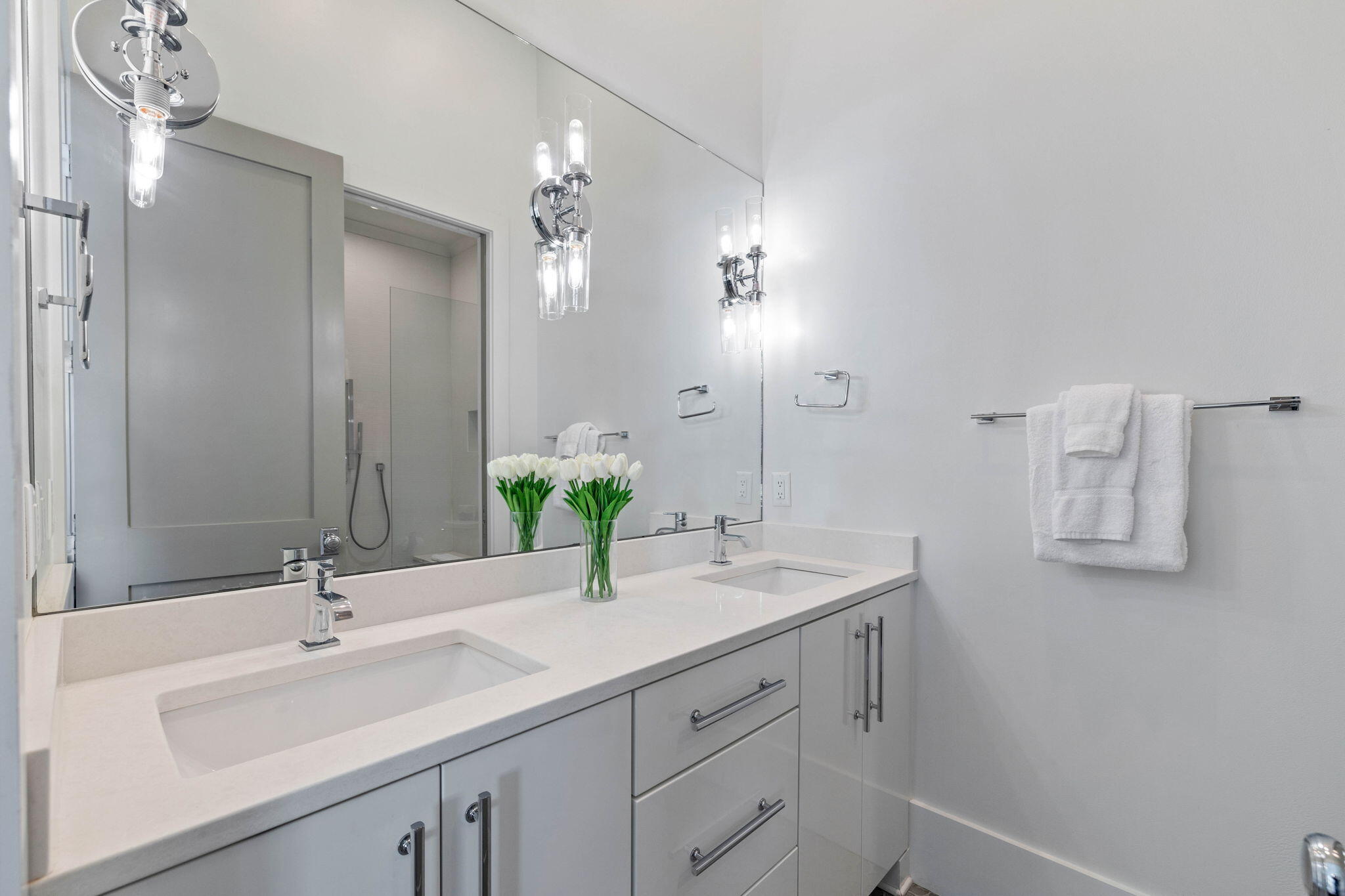 3537 East County Highway 30A Santa Rosa Beach, FL 32459 - Photo 32 of 56 a bathroom with a sink and a mirror