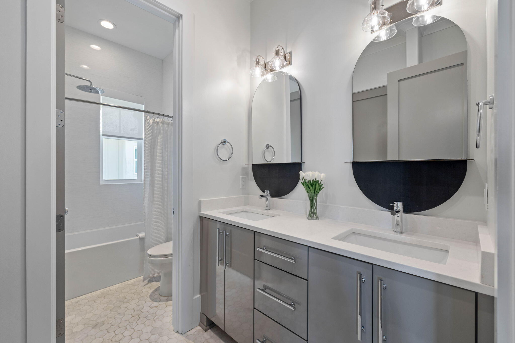 3537 East County Highway 30A Santa Rosa Beach, FL 32459 - Photo 37 of 56 a bathroom with a double vanity sink and a mirror