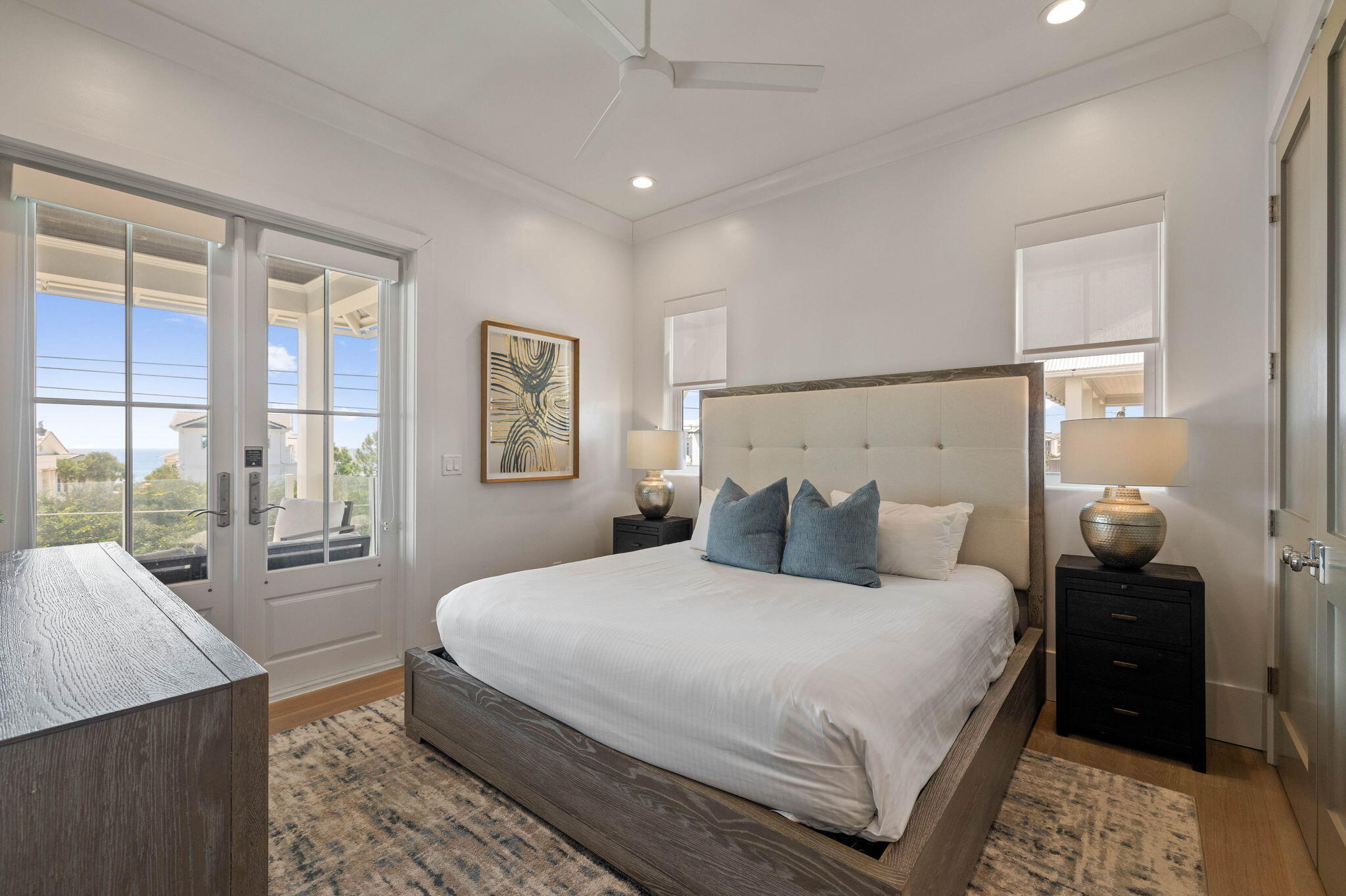 3537 East County Highway 30A Santa Rosa Beach, FL 32459 - Photo 38 of 56 a bedroom with a large bed and a balcony