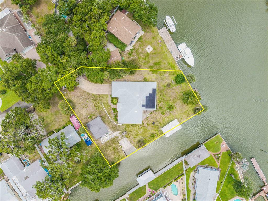 192 Azalea Road Edgewater, FL 32141 - Photo 90 of 94 an aerial view of a house with a swimming pool