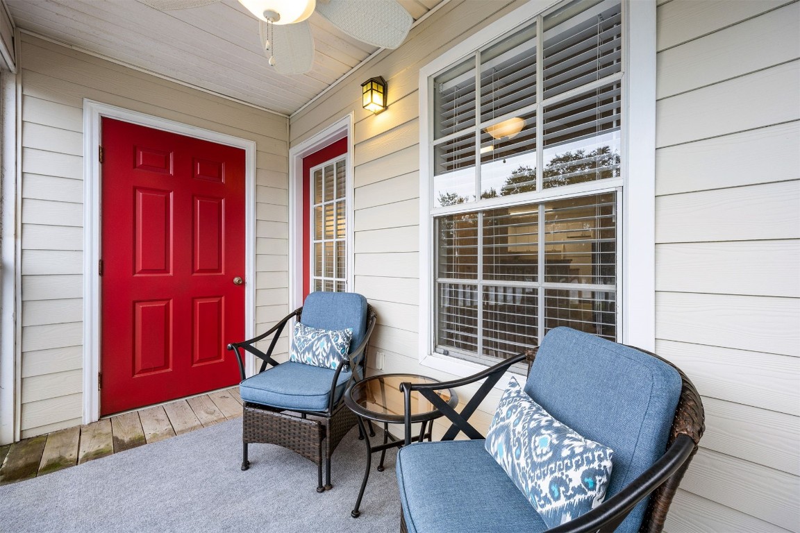 23583 Bahama Point, Unit 1521 Fernandina Beach, FL 32034 - Photo 3 of 34 Screened Balcony with Lake View. Great for Morning Coffee and Evening Relaxation!