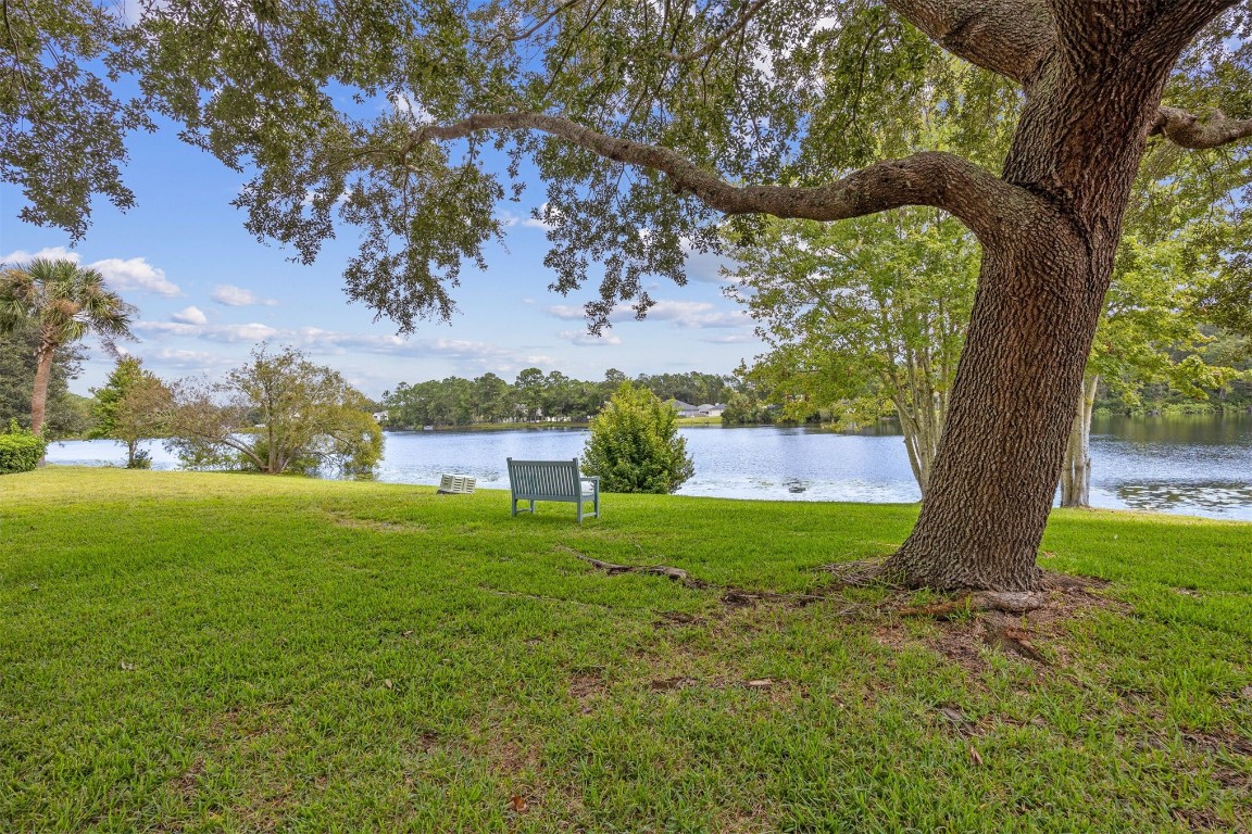 23583 Bahama Point, Unit 1521 Fernandina Beach, FL 32034 - Photo 4 of 34 Peaceful Lake for Picnics, Strolls, and Serene Views!