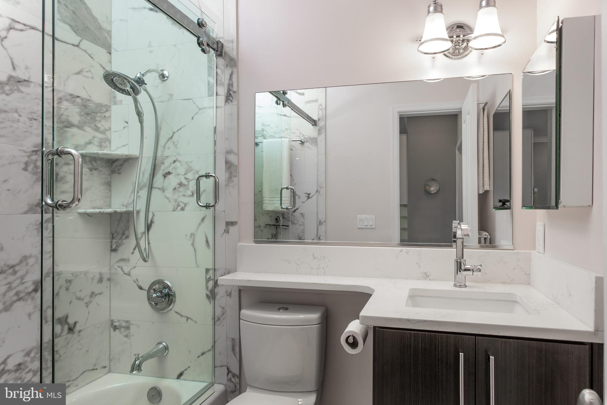 20 Logan Circle Northwest, Unit 33 Washington, DC 20005 - Photo 19 of 27 2nd bathroom renovated with thought and care.