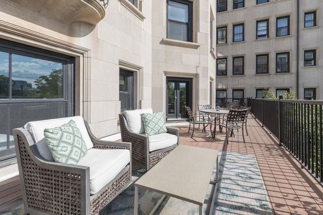 a view of a patio on the deck front of house